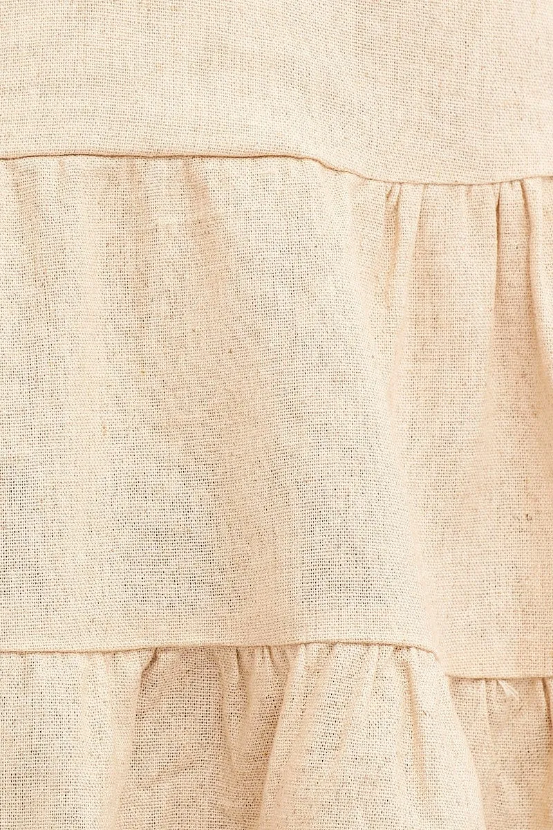 Beige Peplum Top Sleeveless